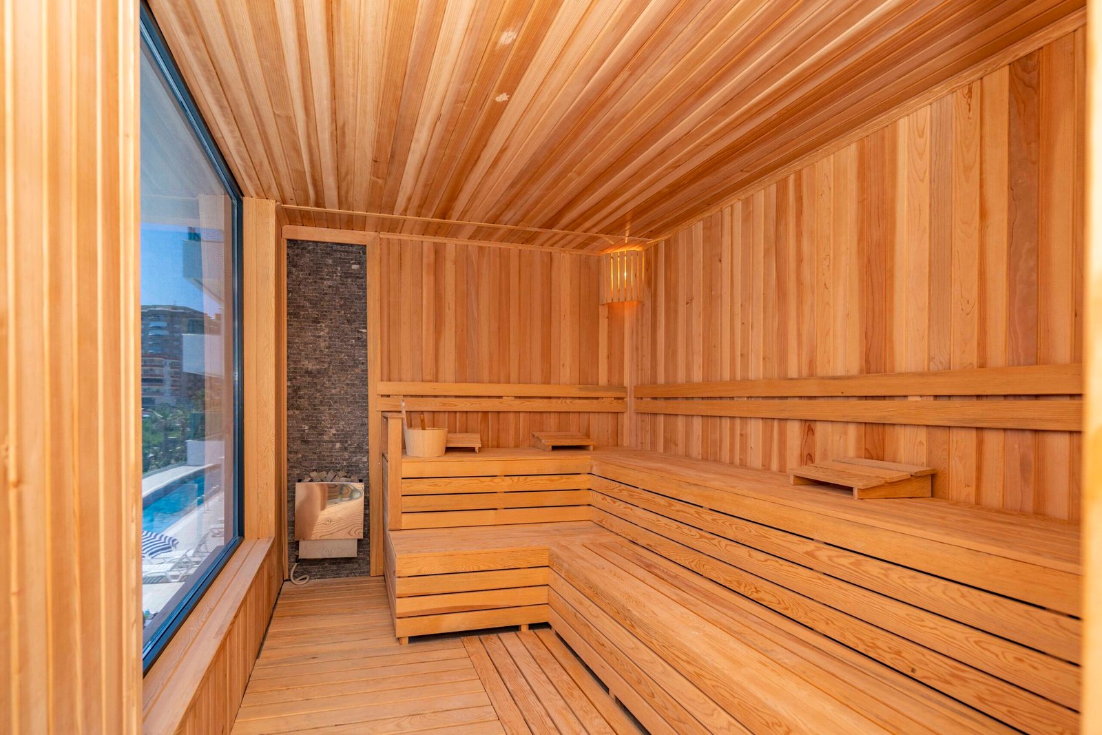 Traditional wet sauna with classic wood interior and ergonomic design